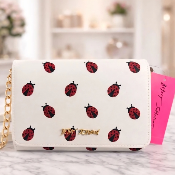 Betsey Johnson Handbags - Betsey Johnson White Crossbody with Red Ladybug Print Nwt